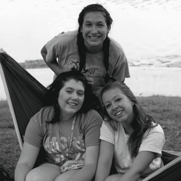 Community girls enjoying outdoor time at Rolling Hills Church event.